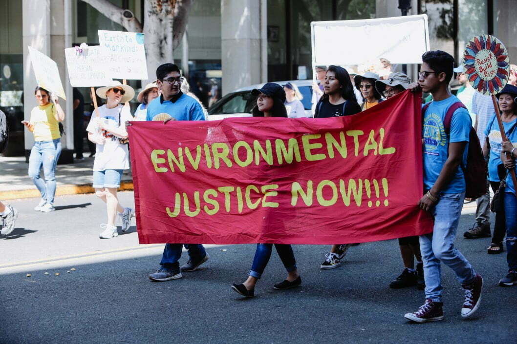 young diverse millenial millenials protest protesting global climate change political rally earth day t20 YVd3vm Amazon shareholders to vote on revealing retailer’s plastic footprint