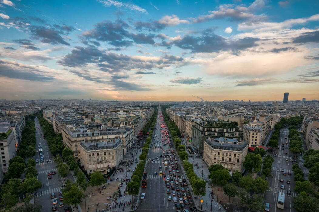 paris france sunset over the champs lys es t20 NV49K2 Cities Like Paris May Be Optimal Urban Form For Reducing Greenhouse Gas Emissions