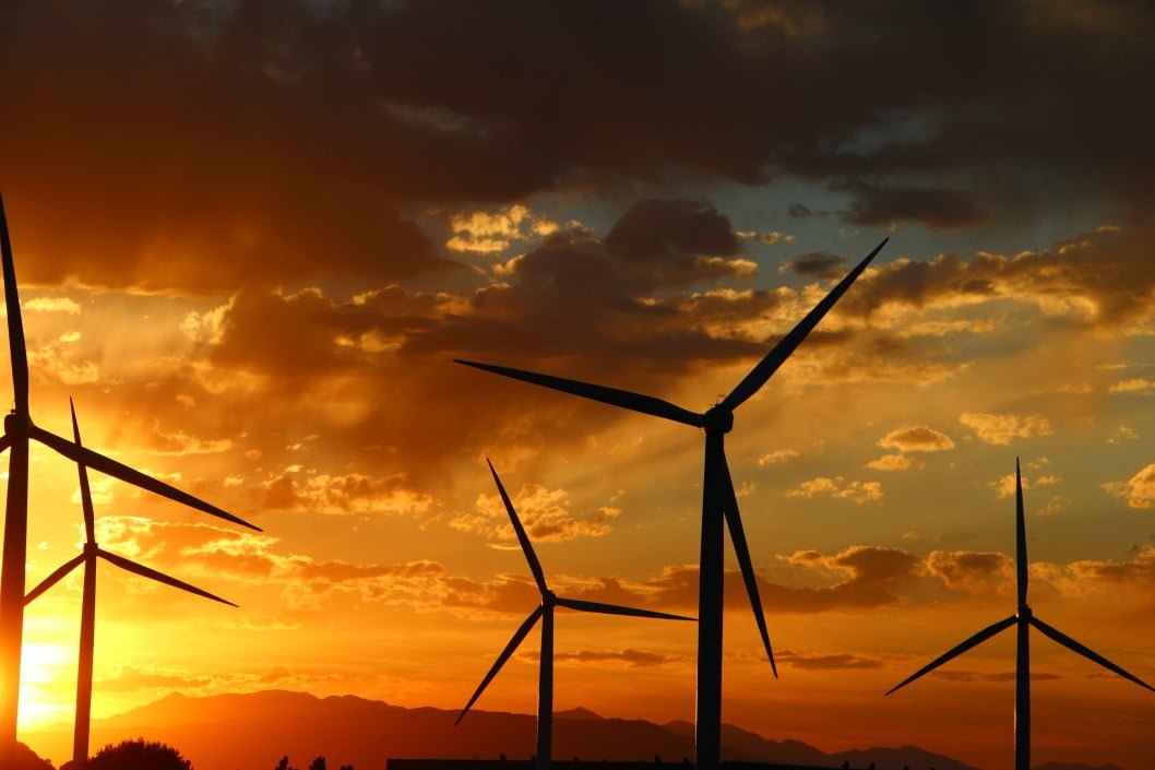solar sunset solar windmills against gorgeous golden hour sunset background wind sustainable power t20 GGPdk6 Massachusetts Enacts A Climate Law Of Its Own