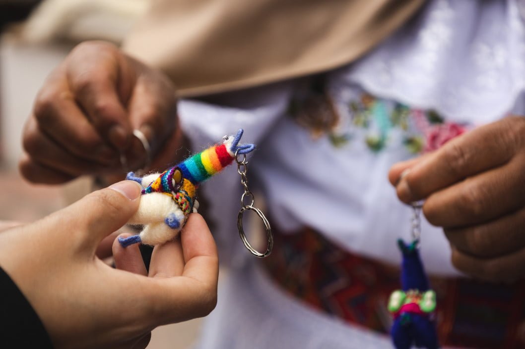 hands llama closeup indigenous marketplace llamas hands in frame handmade toys handmade craft t20 nXmPLR Indigenous Land Rights Are Critical to Realizing Goals of the Paris Climate Accord, a New Study Finds
