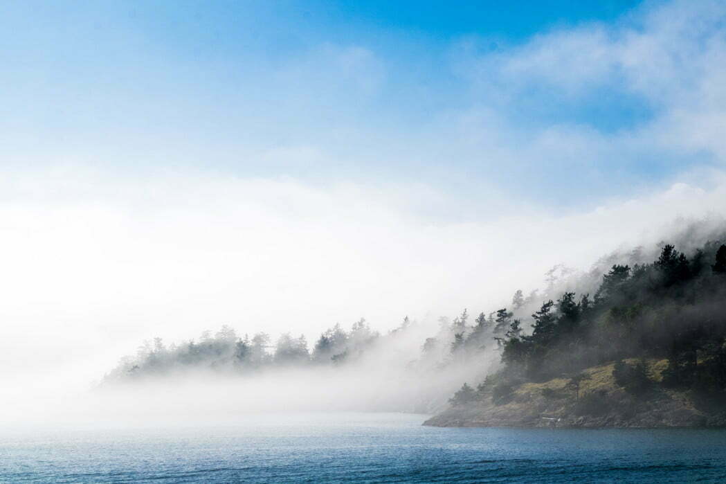 shaw island shrouded in fog in the san juan islands of washington state t20 K6Yrp9 A model for sustainable tourism in the San Juan Islands