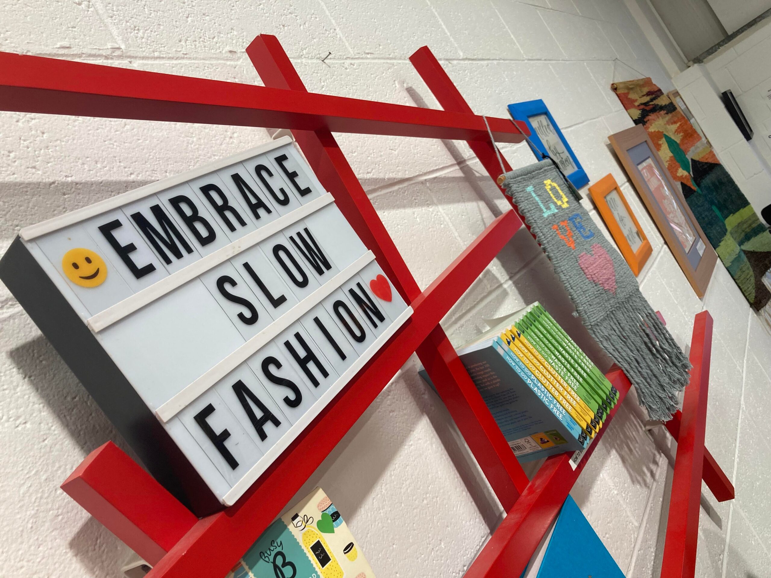 Embrace slow fashion wall scaled The Biggest Challenges of Buying Second-Hand and How to Overcome Them