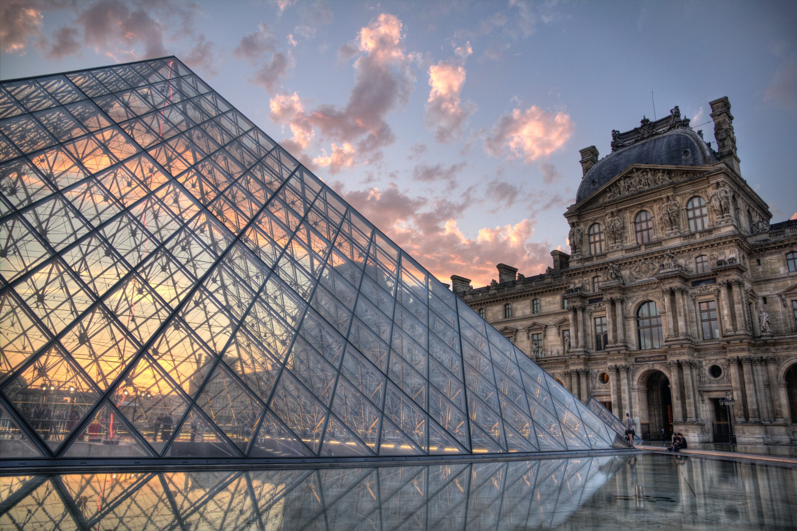 louvre paris ASm3VDlwblE unsplash scaled <strong>Unexpected Ways Travel Is Becoming Greener</strong>