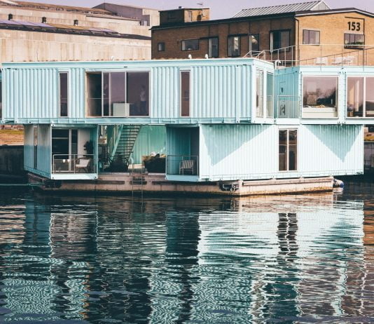 nick karvounis SmIM3m8f3Pw unsplash scaled 1 Float Anywhere; this Solar-Powered Houseboat is the Future of Tiny Living.